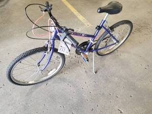 lot 713 image: Huffy Leading Edge Womens 21 10-speed Trail Bike with 15 Purple Frame