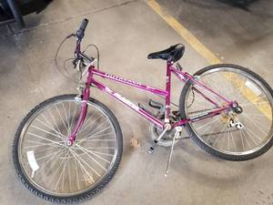 lot 741 image: Magna Outreach Womens 24 15-speed Trail Bike with 18 Purple Frame