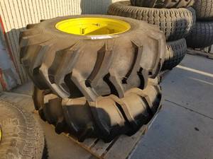 lot 16 image: Lot of (2) Firestone Traction Field & Sand 16.9-24 Tire with 15 Steel Wheel