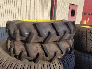 lot 25 image: Lot of (2) Firestone Shock Fortified 8.3-24 on 7 Pin Tires with Tractor Wheel