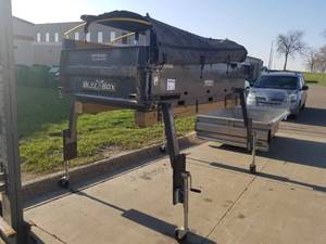 lot 21 image: Crysteel Truck Equipment Buzz Box Material Handler 115Lx95W  with 4 Rolling Stands