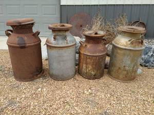 lot 413 image: Four Milk Cans
