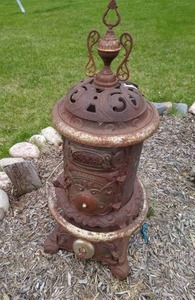 lot 6 image: Vintage Red-Oak 114 Potbelly Stove By  Bergstrom Stove Co.
