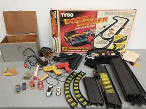 lot 1 image: Vintage TYCO Double Danger - Slotless Racing Set, Assorted Cars and Tracks