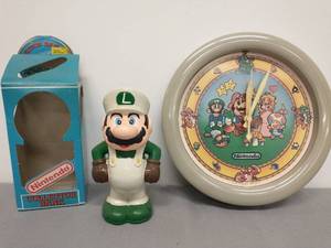 lot 23 image: Nintendo Collector Bank and Wall Clock