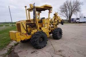 lot 2 image: 1989 Vermeer Model M495 4 x 4 Rear Mount Cable Plow