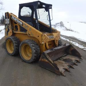 lot 5 image: Mustang Model 2060 Skid Loader Skid Steer