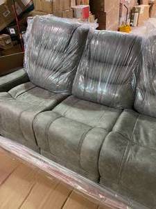 Ashley Cave Warrior Power Reclining Leather Match Sofa (9430115)