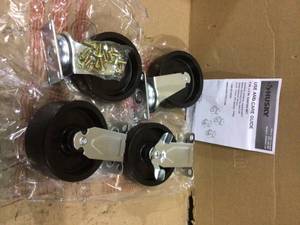 lot 25 image: 5 in. Black PP Caster Kit for Ready-to-Assemble Steel Garage Base Cabinets Customer Returns See Pictures