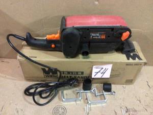7-Amp Corded 3 in. x 21 in. Variable Speed Combination Handheld and Benchtop Belt Sander by WEN Customer Returns See Pictures