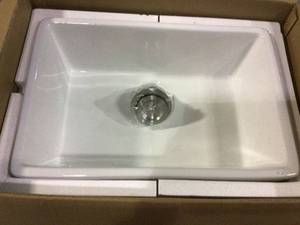 lot 26 image: Kingsman Durable White Fireclay 23.75 in. Single Bowl Farmhouse Apron Kitchen Sink with Strainer Customer Returns See Pictures 