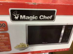 lot 58 image: 1.6 cu. ft. Countertop Microwave in Stainless steel with Gray Cavity by Magic Chef Customer Returns See Pictures 
