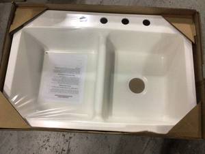 lot 98 image: Bridgeport Dual Mount Composite Granite 33 in. 4-Hole Double Bowl Kitchen Sink in White Customer Returns See Pictures 