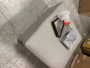 lot 101 image: Ashley Furniture oversized ottoman not used see pictures