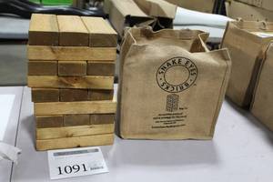 lot 1091 image: Wood Snake Eyes Bricks Yard Game  with Carry Bag
