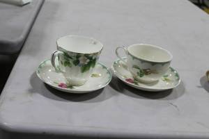 lot 1046 image: Lot of (2) Ceramic Tea CupSaucer Sets