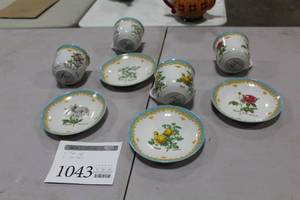 lot 1043 image: Lot of (4) Rose Pattern Ceramic Tea CupSaucer Sets