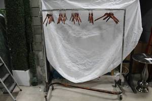 lot 1169 image: Metal Z-Rack Clothes Cart 62Lx23Wx68-12H  with Hangers (x25)