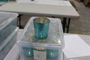 lot 1843 image: Lot of (24) Glass Candleholders Teal  2-12Dx3H (in 2 bins)