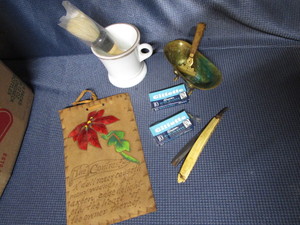 lot 56 image: Leather quote about razor, shaving ...