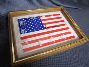 lot 61 image: Wall clock with US flag background,...