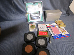 lot 87 image: Coin coasters, playing cards, games...