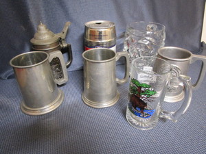 lot 124 image: Beer steins - Schmidt, glass skull...