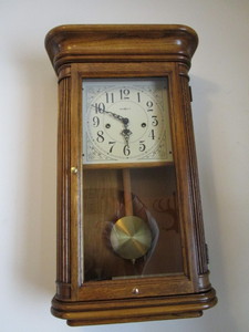 lot 201 image: Howard Miller wall clock, key wind,...