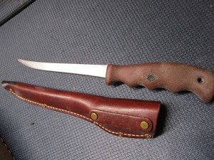 lot 206 image: Buck 123 filet knife with black she...