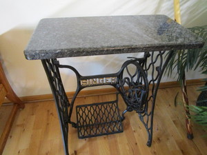 lot 32 image: Singer treadle stand with marble to...