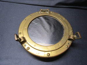 lot 242 image: Brass porthole style mirror, 11...