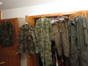 lot 276 image: Camo shirts , coveralls, insulated...