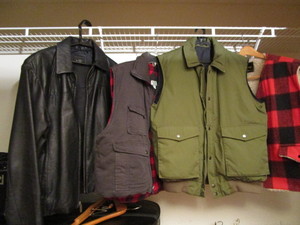 lot 284 image: Leather dress jacket M, vests with ...