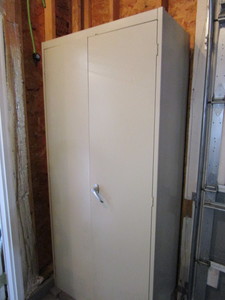 lot 15 image: Metal double door cabinet 36Wx18D...