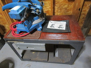 lot 21 image: Ryobi 10 miter saw, table 34x20x...