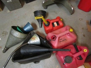 lot 388 image: Gas cans - one & two gallon, oil pa...
