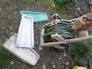 lot 421 image: Hose & reel, downspout splash trays...