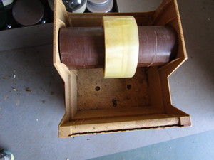 lot 450 image: Commercial tape dispenser, holds up...