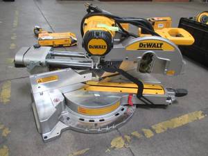lot 3 image: DEWALT 15 Amp 12 in. Double Bevel Sliding Compound Miter Saw, DWS780 - Missing Minor Parts, Works.