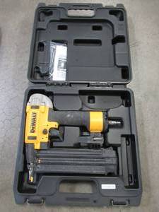 lot 10 image: DEWALT 18-Gauge Pneumatic Brad Nailer, DWFP12233 - Used.