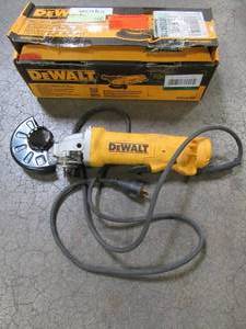 lot 17 image: Dewalt 11 Amp 4-12 in. Angle Grinder, DWE402W - Used. - Missing Handle and Nut.