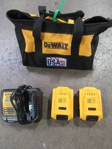 lot 39 image: DEWALT 20-Volt MAX XR Lithium-Ion Starter Kit with Premium Battery Pack 5.0Ah (2-Pack), Charger and Kit Bag, DCB205-2CK. Used.