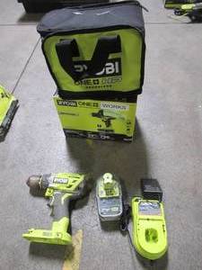 lot 54 image: RYOBI ONE HP 18V Brushless Cordless 12 in. Hammer Drill Kit with (1) 4.0 Ah High Performance Battery, Charger, and Tool Bag, PBLHM101K - Used.