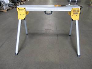lot 70 image: DEWALT Compact Miter Saw Stand DWX724 - Slight Dents, Missing Mounting Brackets.