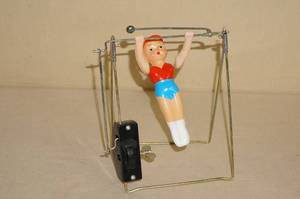 lot 25 image: Vintage Mechanical Wind Up Gymnast Toy