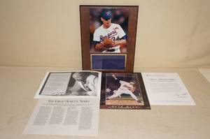 lot 115 image: Nolan Knows Bo Picture Plaque and Nolan Ryan Rick Rush Art Piece