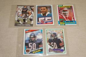 lot 64 image: 5 Rookie and Early Career Football Cards - Singletary, Seau, Bennett, Thomas