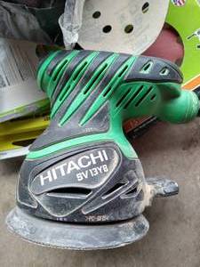 Hitachi Electric Sander & Bag of Sanding Materials