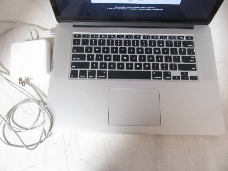 lot 2 image: Apple&nbspMacBookPro11,4&nbspINTEL(R) CORE(TM) I7-4770HQ CPU  2.20GHZ 16GB RAM 256GB HD&nbspMac OS X 10.10.3 (El Capitan)  wcharger 