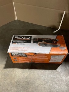 lot 12 image: RIGID 6.5 AMP CORDED 3 IN. X 18 IN. HEAVY-DUTY VARIABLE SPEED BELT SANDER WITH AIRGUARD TECHNOLOGY. SEE PICTURES